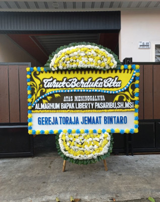 Papan Bunga Duka di Sayang